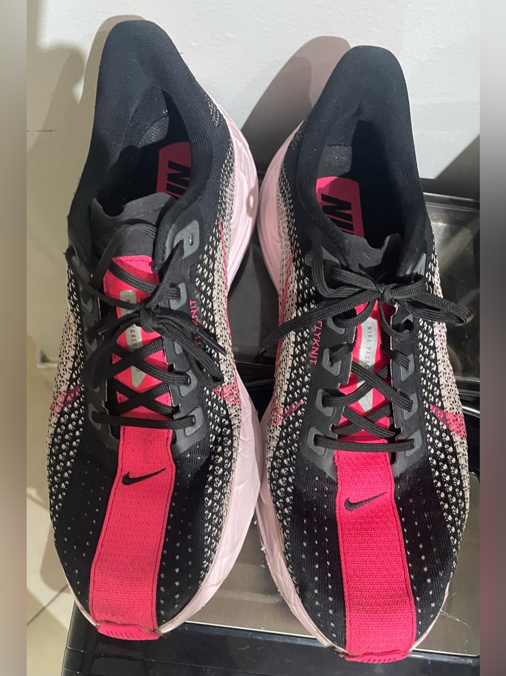 Nike Women's Black and Hot Pink Flyknit Running Sneakers